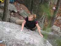 Susanna working the 5.9 variation of Dennis. (Category:  Rock Climbing)