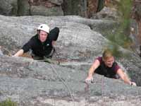Susanna working the 5.9 variation of Dennis. (Category:  Rock Climbing)