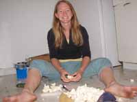 Becky cooking an entire head of cauliflower. (Category:  Rock Climbing)