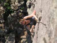 Tina following The East Slab of The Dome. (Category:  Rock Climbing)