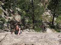 Tina following The East Slab of The Dome. (Category:  Rock Climbing)