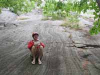 Me on the start of Clip a Dee Doo Dah.  The second class, 30 degree slab at the start of the climb is (Category:  Rock Climbing)