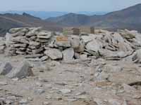 Remnants of an old hut on the plateau below the summit. (Category:  Rock Climbing)