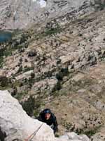 Chris reaching the summit. (Category:  Rock Climbing)