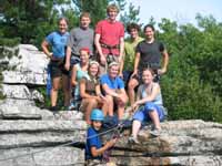 Standing: Katie, Adam, Ansel, Kerran, Chelsea.  Sitting: Molly, Dallas, Holly, Kristin.  Ready to Tyro: Joe (Category:  Rock Climbing)