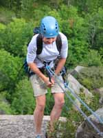 Beth rappelling off Gamesmanship. (Category:  Rock Climbing)