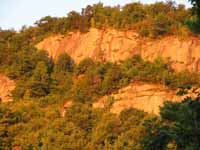 Sun just hitting poke-o's upper cliffs. (Category:  Rock Climbing)