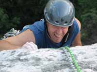 Jim crimping hard on the crux of Arrow. (Category:  Rock Climbing)