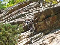 At the crux corner on Strictly From Nowhere.  That's a red alien in my mouth. (Category:  Rock Climbing)