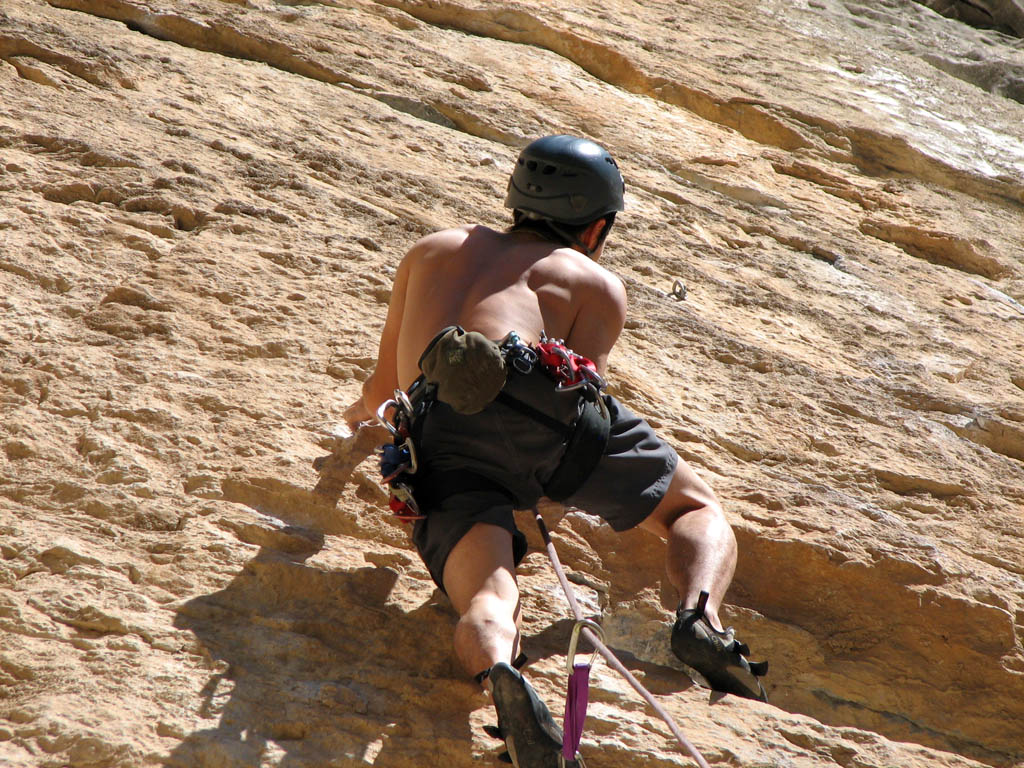 Kenny leading at Outrage Wall. (Category:  Rock Climbing)
