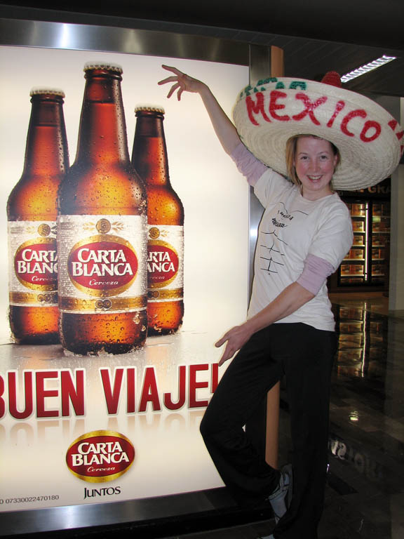 Beth at the Monterrey airport.  Tourists?  Us?  You jest! (Category:  Rock Climbing)