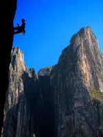 Kenny working a very hard climb above Upper Virgin Wall. (Category:  Rock Climbing)