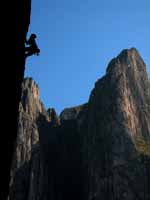 Kenny working the very hard climb. (Category:  Rock Climbing)