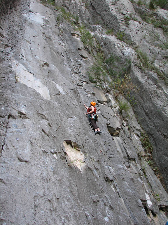 Kristin leading the first pitch (5.11a) of Super Nova. (Category:  Rock Climbing)