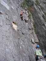 Kristin leading the first pitch (5.11a) of Super Nova. (Category:  Rock Climbing)