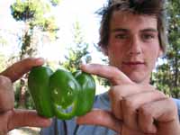 We went grocery shopping.  Guy is very happy to have fresh produce.  But he thinks we should have bought red peppers instead. (Category:  Rock Climbing)