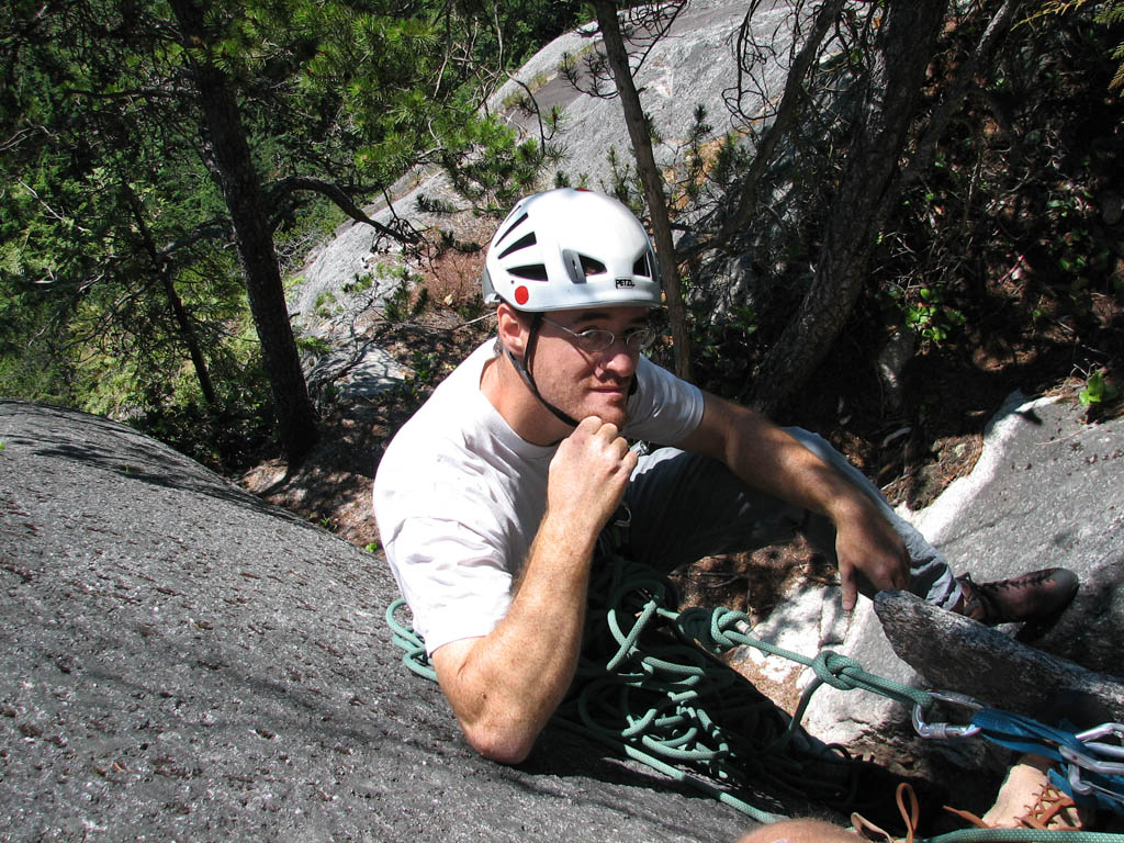 Striking a pose at the top of Slot Machine. (Category:  Rock Climbing)