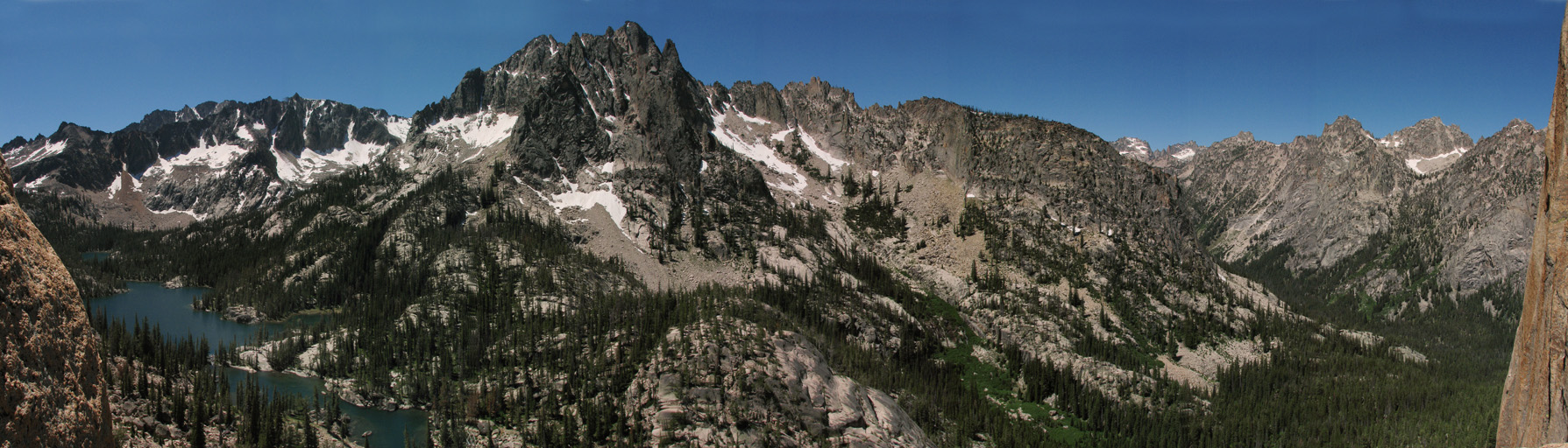 Gorgeous panorama of the Sawtooths seen from 200' up the SW face of Elephant's Perch. (Category:  Rock Climbing)
