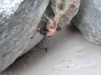 Guy bouldering at the base of Elephant Rock. (Category:  Rock Climbing)