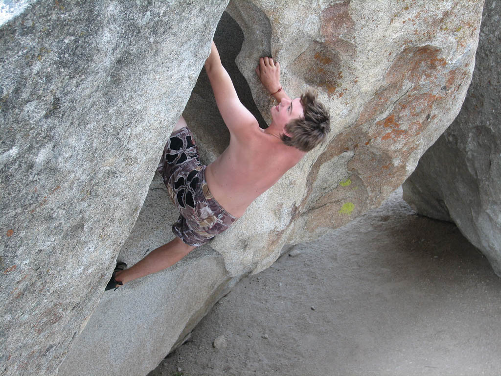 Guy bouldering at the base of Elephant Rock. (Category:  Rock Climbing)