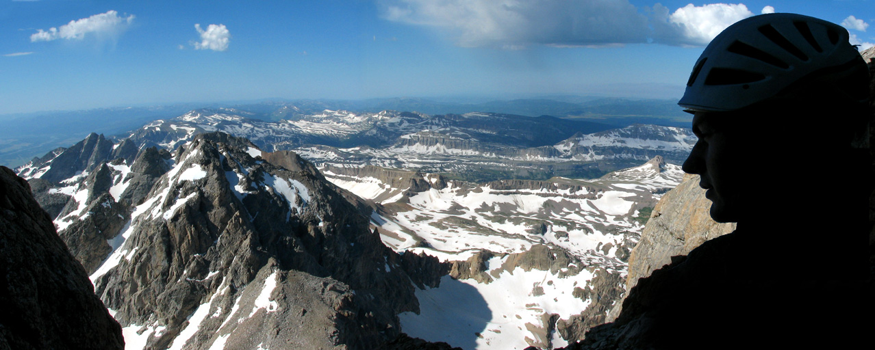 Panorama of Guy enjoying the view from the Grand Teton. (Category:  Rock Climbing)