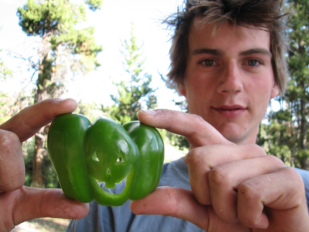 We went grocery shopping.  Guy is very happy to have fresh produce.  But he thinks we should have bought red peppers instead. (Category:  Rock Climbing)