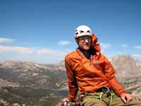 At the top of Haystack.  Like the guidebook says, if it is windy anywhere in the world, it is windy here. (Category:  Rock Climbing)