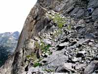 Guy finishing the traverse of Overhanging Tower on the approach to Shark's Nose. (Category:  Rock Climbing)