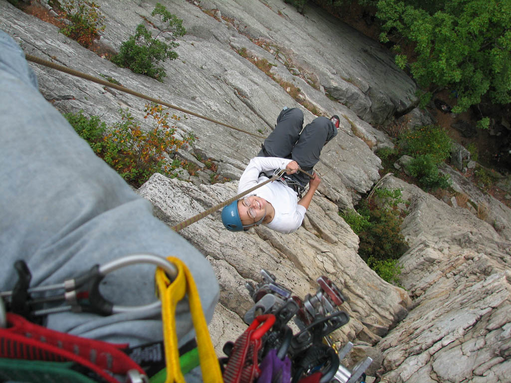 Emily on the free-hanging portion of the Madame G's rappel. (Category:  Rock Climbing)