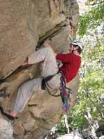 Guy following Colorful Crack. (Category:  Rock Climbing)