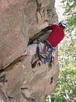 Guy following Colorful Crack. (Category:  Rock Climbing)
