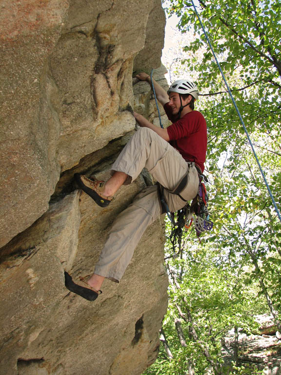 Guy following Colorful Crack. (Category:  Rock Climbing)