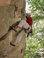 Guy following Colorful Crack. (Category:  Rock Climbing)