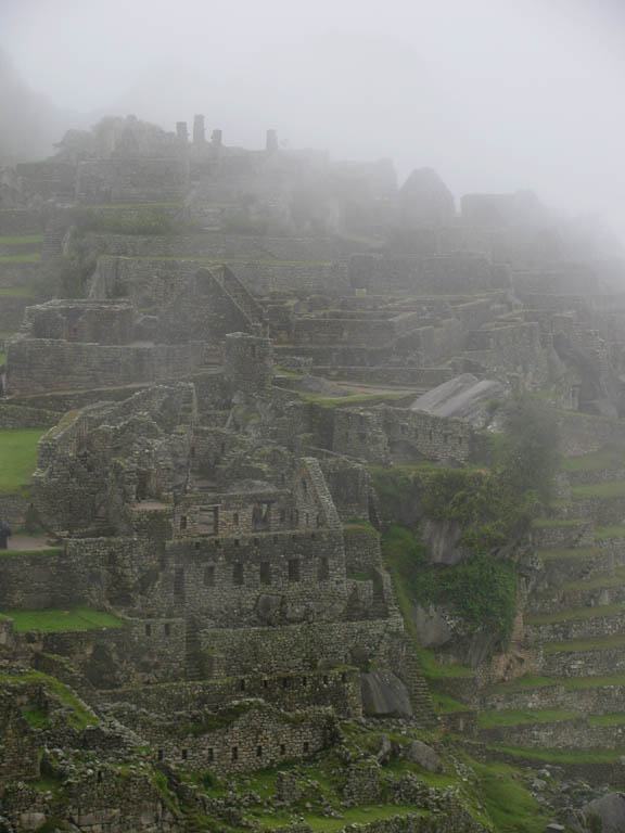 Machu Picchu emerging from the mist. (Category:  Travel)