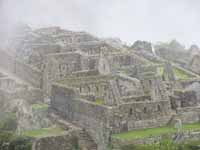 Machu Picchu emerging from the mist. (Category:  Travel)