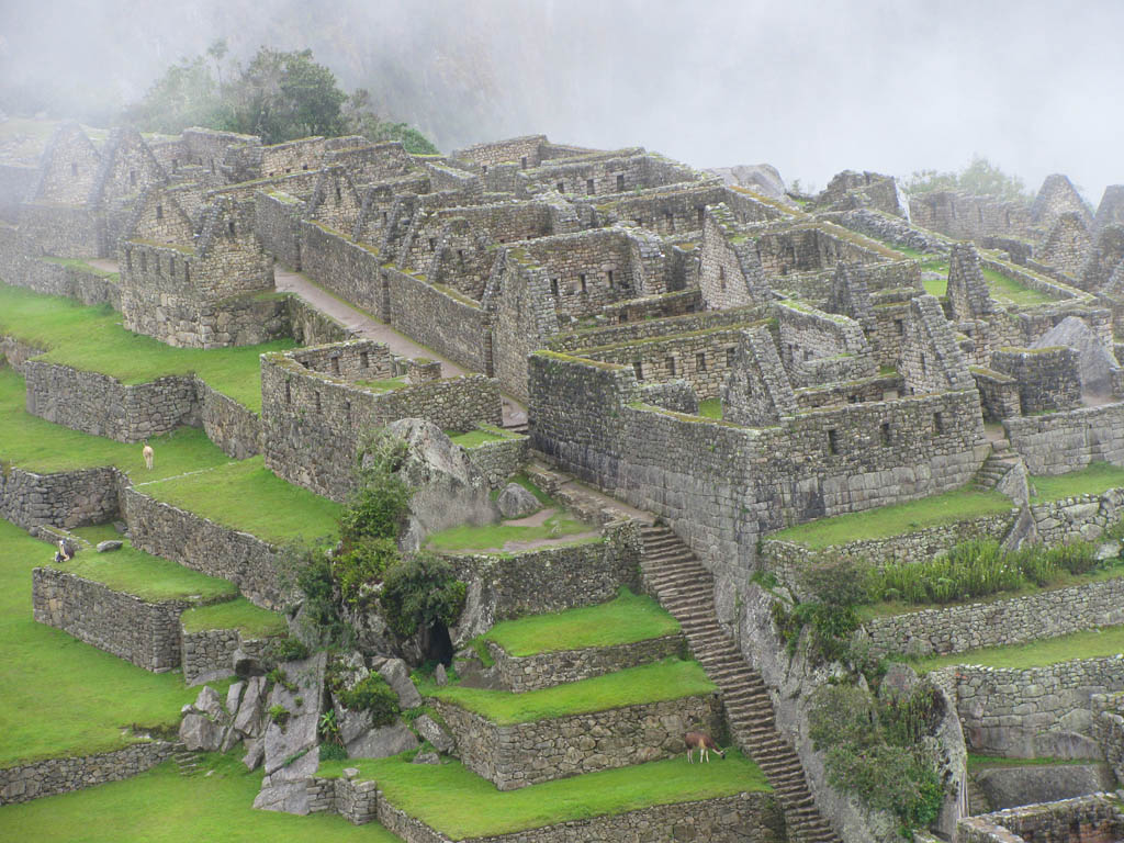 Machu Picchu emerging from the mist.  What can I say?  There was a lot of mist.  You take what photos you can. (Category:  Travel)