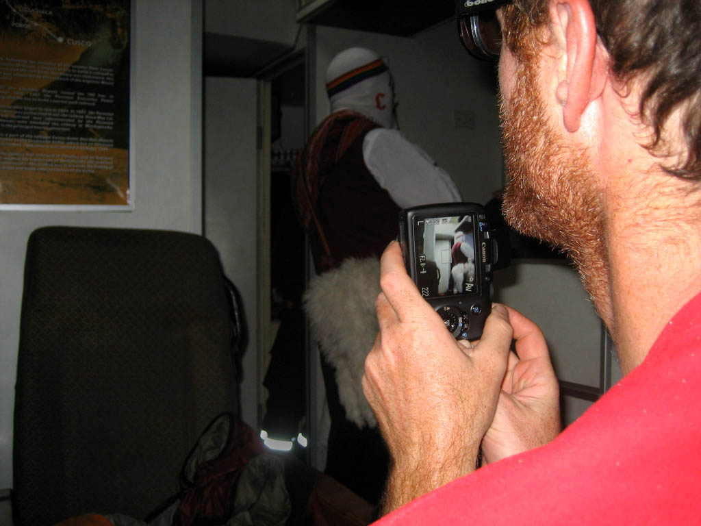 Taking a picture of the dancer from the train. (Category:  Travel)