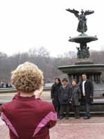 Emily taking a picture for a bunch of other tourists in Central Park. (Category:  Travel)