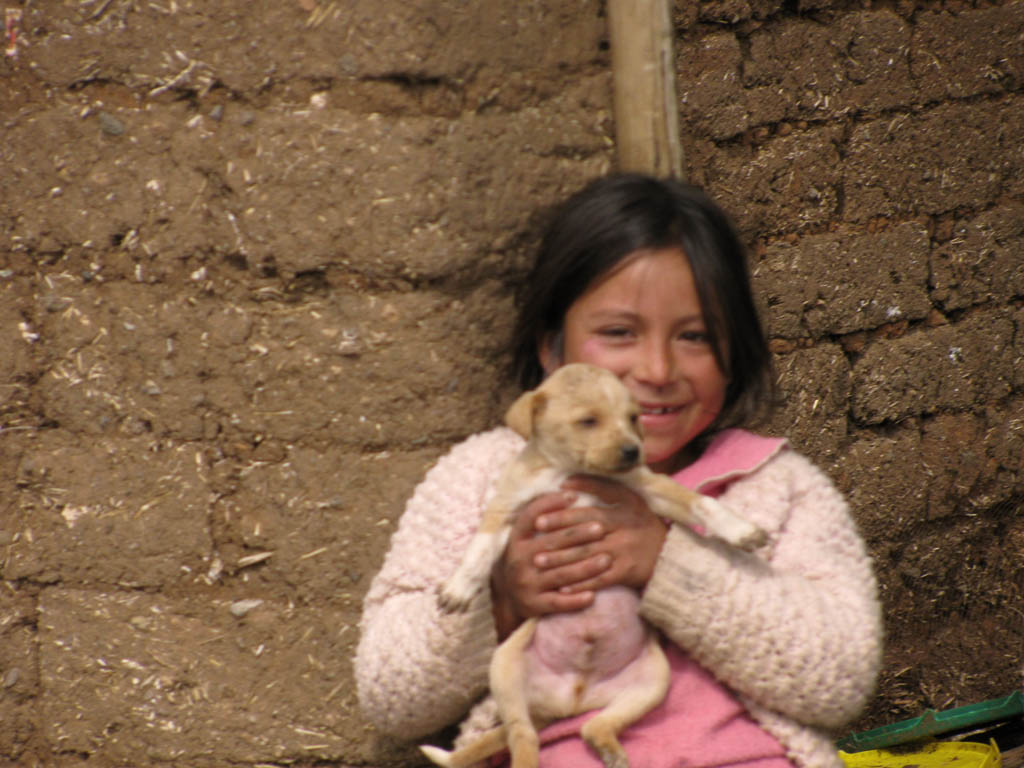 Argh!!!  I should have jumped off my horse and taken a bunch of pictures of this girl and her puppy... (Category:  Travel)