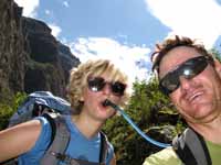 Drinking tubes are great.  If you have one, people will ask to drink your water.  This is a good way to get a lighter pack. (Category:  Travel)