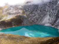 The amazing emerald green Lake Taullicocha. (Category:  Travel)