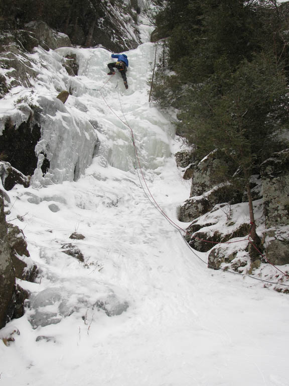 Guy nearly finished with the first pitch. (Category:  Ice Climbing)