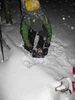 Adjusting snowshoes. (Category:  Ice Climbing)