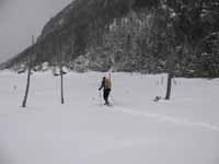 Guy starting across Avalanche Lake. (Category:  Ice Climbing)