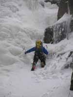 Guy leading the third ice step. (Category:  Ice Climbing)