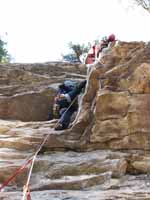 Zupes belaying Melissa through the crux of Strictly From Nowhere. (Category:  Rock Climbing)