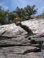 Katie in the squeeze chimney on Belly Roll. (Category:  Rock Climbing)