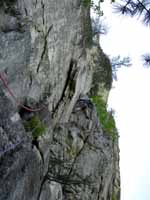 Guy leading the first pitch of Green Wall. (Category:  Rock Climbing)