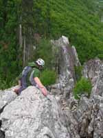 Guy starting down from the South Summit. (Category:  Rock Climbing)