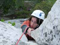 Jen reaching the top of Three Doves (Category:  Rock Climbing)